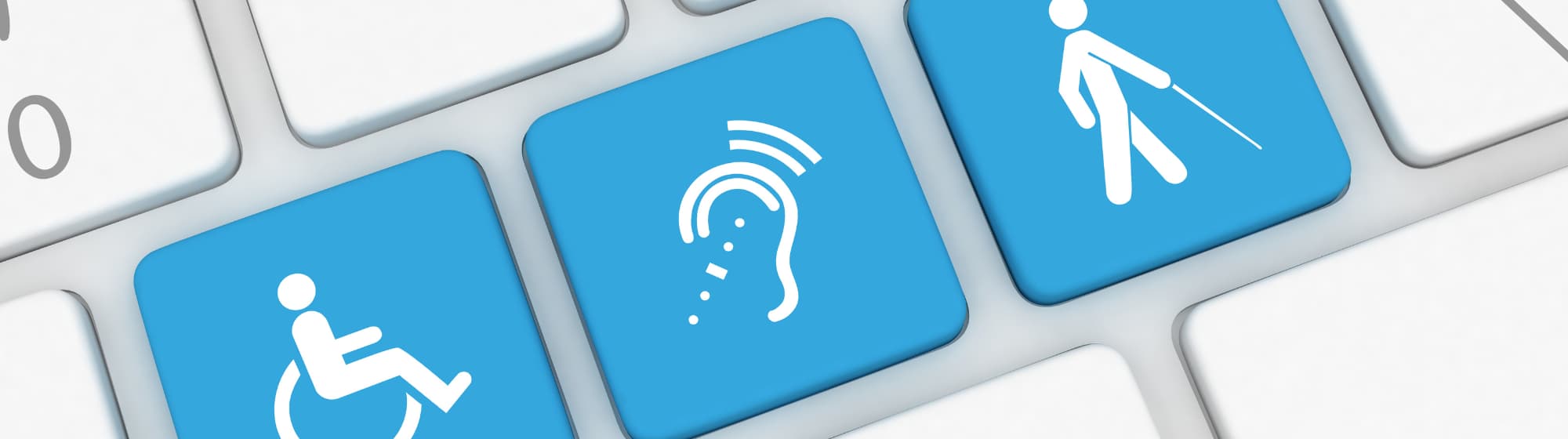 3 icônes d'accessbilité sur un clavier